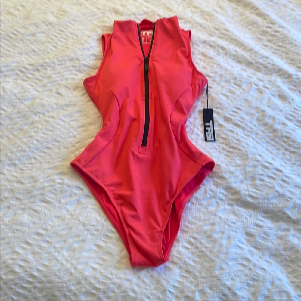 Pink One Piece Swimsuit with High-Cut Leg and V-Neckline